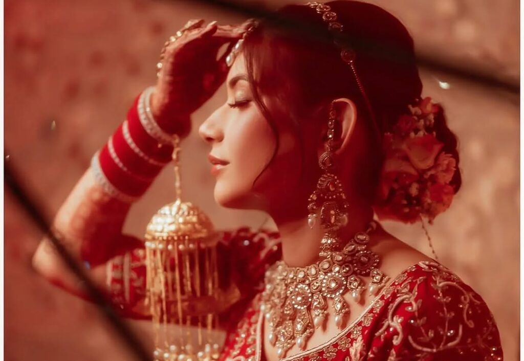 Cinematic bridal portrait with warm lighting trend in Indian weddings 2026 photographed by Vishal Photos
