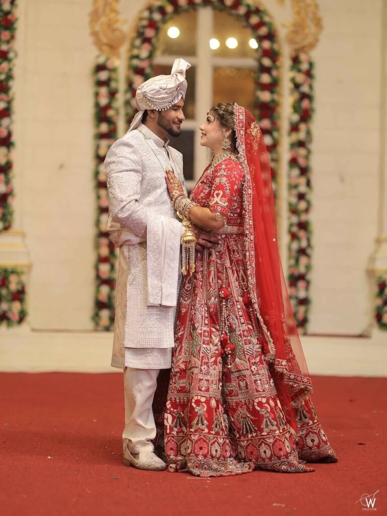 Romantic bride and groom wedding pose in Jaipur photographed by Vishal Photos